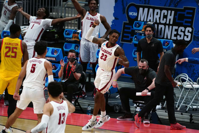 Alabama Crimson Tide guard John Petty Jr. (23) reacts after a play in the second half against the Maryland Terrapins in the second round of the 2021 NCAA Tournament at Bankers Life Fieldhouse.